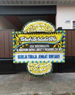 Papan Bunga Duka di Siman